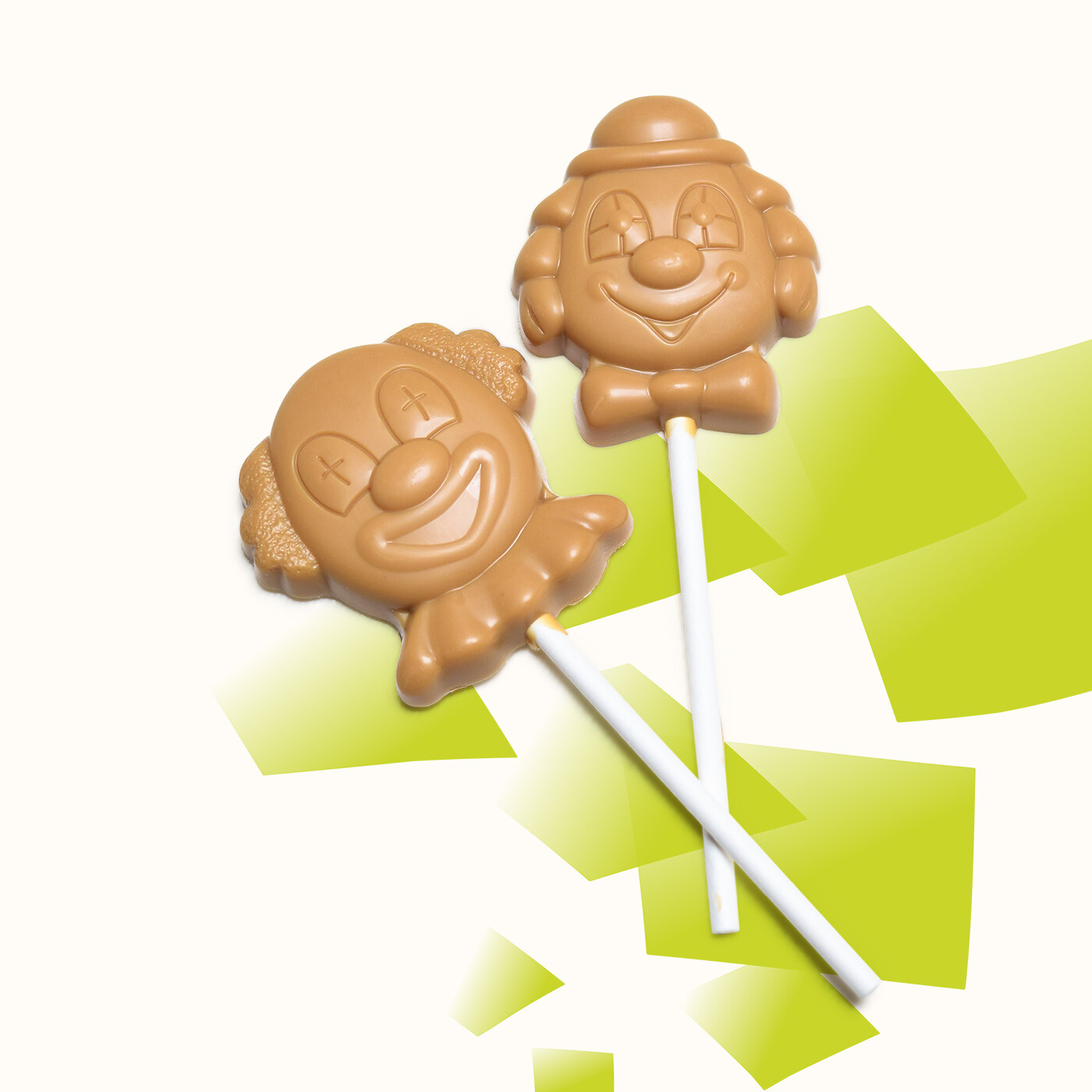 Sucettes au chocolat ivoire en forme de clown